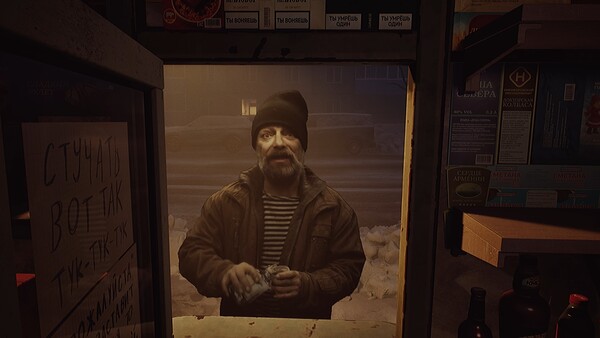 Matvey behind the counter waiting for the next customer